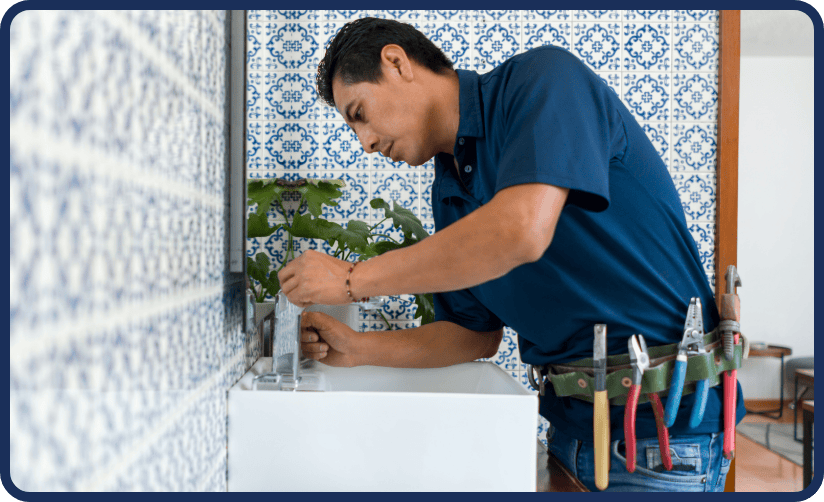 Craftsman Services' expert plumber providing a faucet repair for homeowner in Escondido, California.